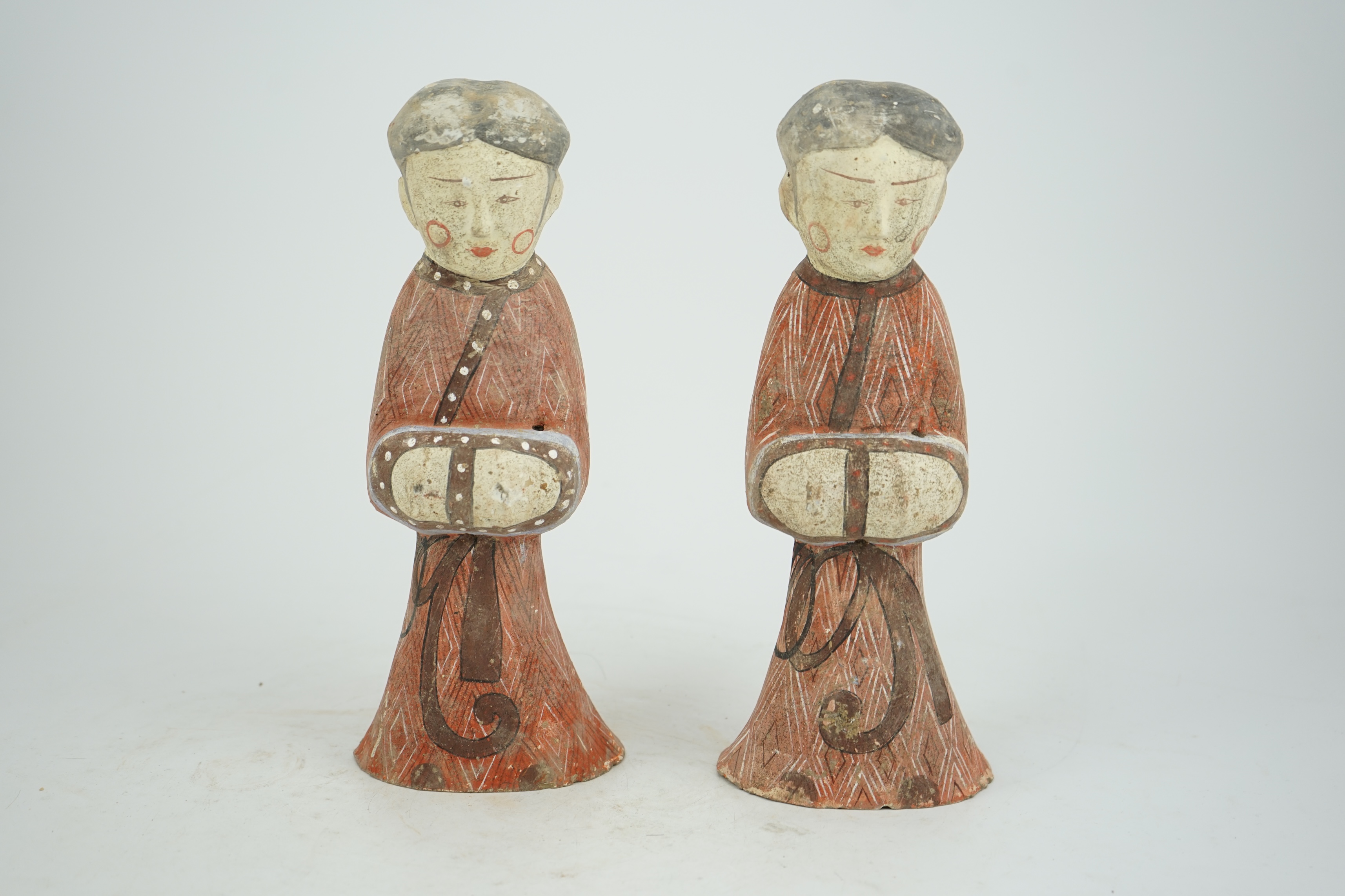 A pair of Chinese Han style painted pottery ladies, 29.5cm